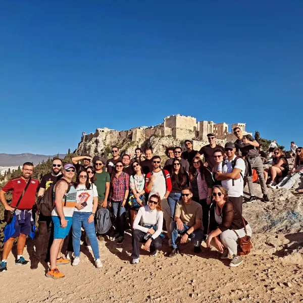 Young international students enjoying a social event and networking gathering in Athens.